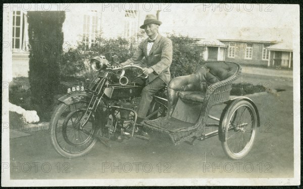 Bertie Rand on a motorbike outside the Nairobi Police Depot