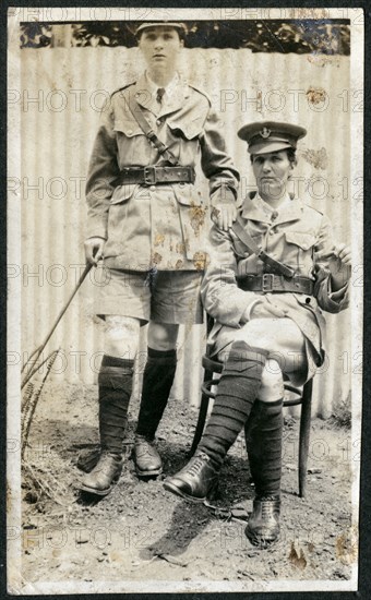 Portrait of European women dressed up in army uniforms