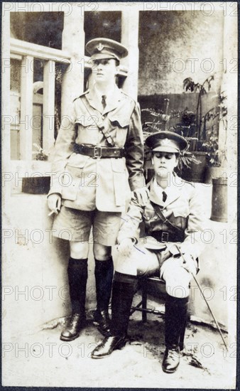 Portrait of European women dressed up in army uniforms