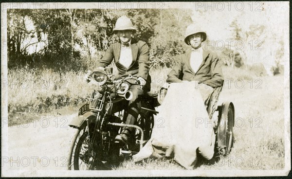 European men with motorbike and sidecar