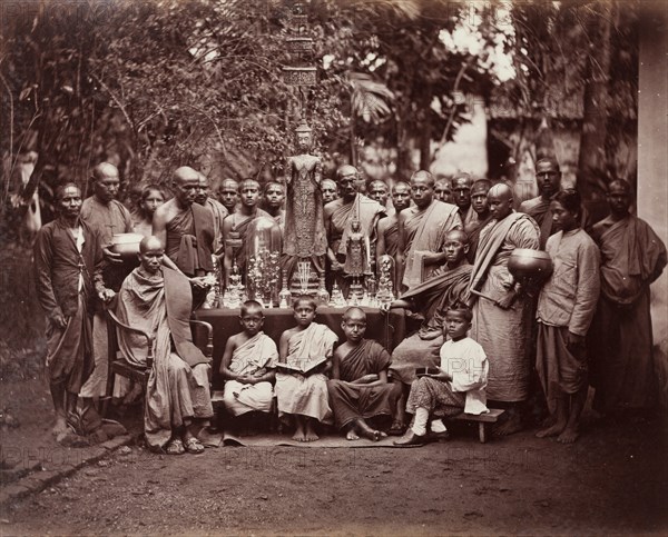 Group of Buddhist monks and altar, Kandy