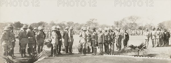 British military personnel greeting Sikh soldiers