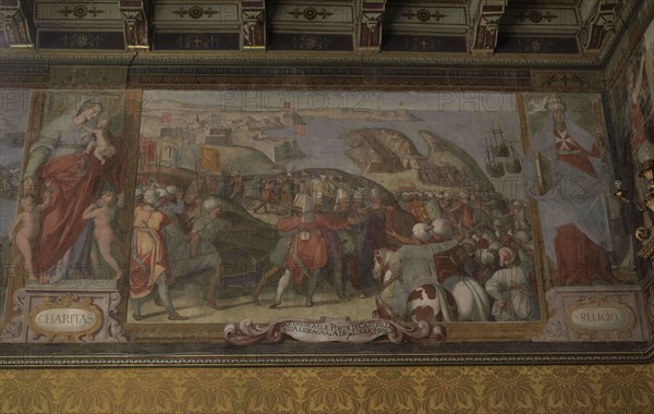 Palace of the Grand Master, 16th-18th centuries. Residence of the Grand Master of the Order of Saint John. Fresco that the decorates the walls of the Supreme Council Room by Matteo Perez de Aleccio (1547-1628). It depicts the Great Siege of Malta by the Ottoman Empire in 1565. Siege of the Turks in July 1565 before the resistance of the gun batteries of the Spanish troops. Valletta. Malta.