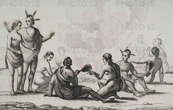 United States of America. 16th century French expedition. Florida. Seminoles Indians celebrating seated around a fire. Jacques Le Moyne de Morgues (1533-1588) made the illustrations during the expedition. 19th century engraving by Vernier after the original of Jacques Le Moyne. Panorama Universal. History of the United States of America, from 1st edition of Jean B.G. Roux de Rochelle's Etats-Unis d'Amérique in 1837. Spanish edition, printed in Barcelona, 1850.