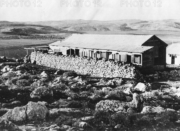 A Jewish house prepares its defense. Jewish colonies located north of the Lebanese-Syrian border fear being the first to suffer attack from Arab forces stationed outside Palestine