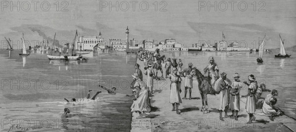 Mahdist War (1881-1899). It faced the followers of Sudanese religious leader Muhammad Ahmad bin Abdullah bin Fahal, the self-proclaimed Mahdi, against Egyptian Khedivate troops, who were later joined by British forces. Massawa, Eritrea. Important port city on the Red Sea, under threat by the Sudanese warlord Osman Digna (1836-1926). View taken from the dock. Drawing by M. Alcazar. Engraving by Bernardo Rico (1825-1894). La Ilustracion Espanola y Americana (The Spanish and American Illustration), February 29, 1884.