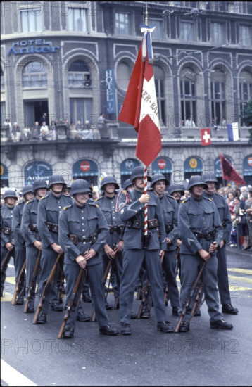 Group wearing historical military uniform.