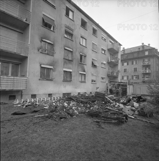 Fire causes explosion of gas bottle in barrack, Zurich 1961.