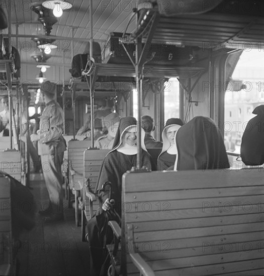 Nurses in a train; 1939.
