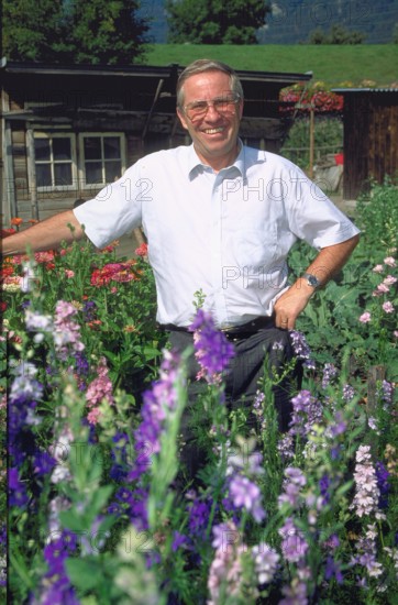 Christoph Blocher in his garden.