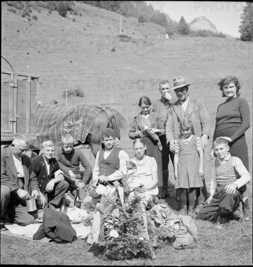 Farmer family at the Kaesteilet in the Justistal valley, Berne, 1941.