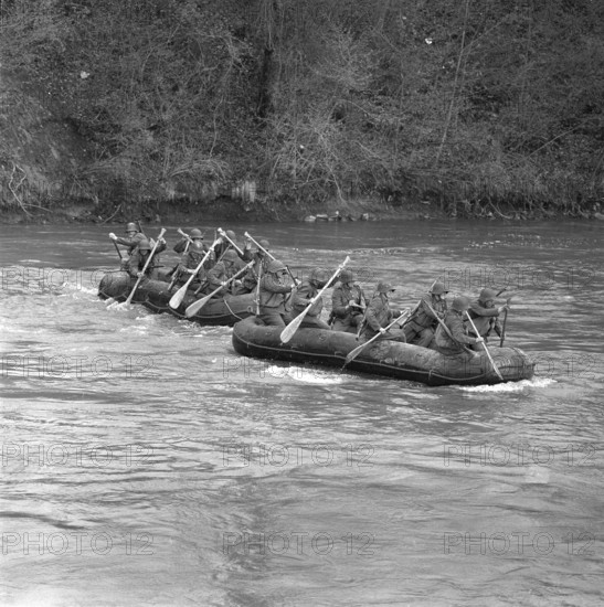 Pontooneers crossing Reuss by rubber dinghy 1956.