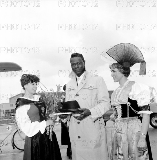 Nat King Cole at the airport of Zurich Kloten, 1960.