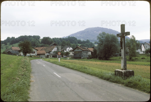 Cross on the roadside in Vellerat, 1980.