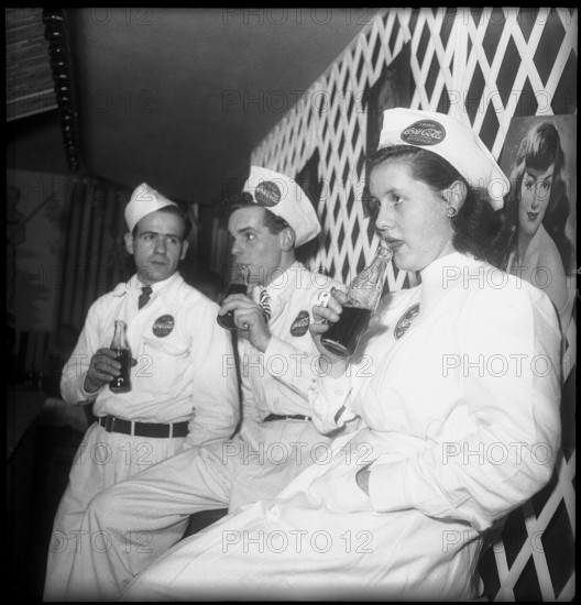 Coca-Cola employees having a break; 1949.