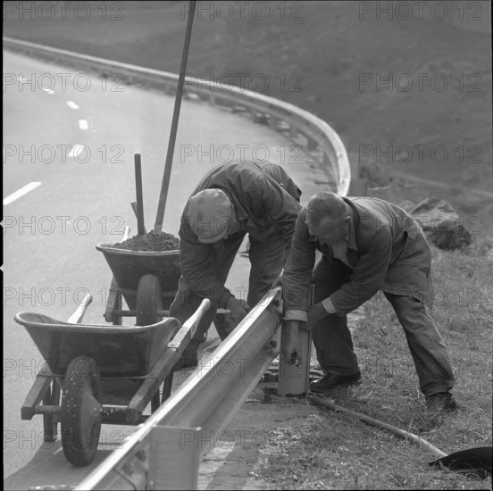 Installing guardrails at road to Gotthard 1961.