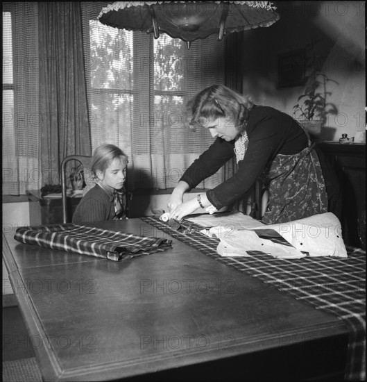 Woman making a dress, Basel 1949.