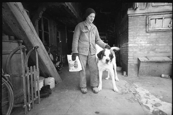 Man with dog in the Emmental, 1970.