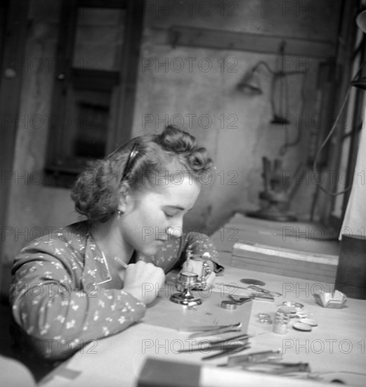 Watch maker in the Cortebert watch factory; 1941.