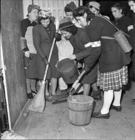 Women of a war fire brigade; 1944.