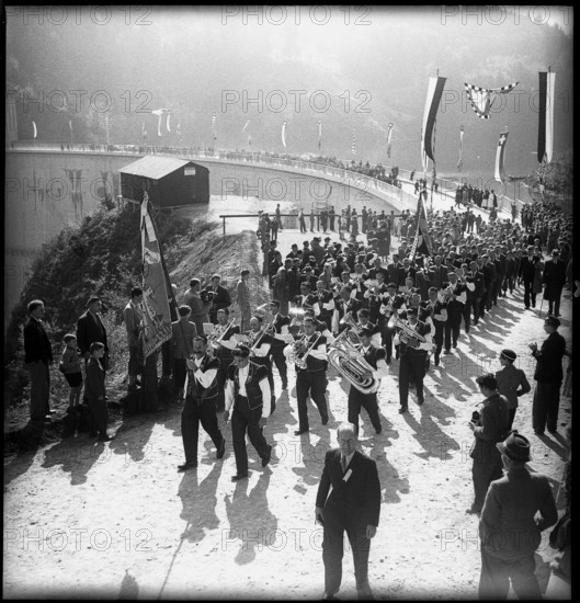 Lake Gruyere, opening of the Rossens dam 1948.