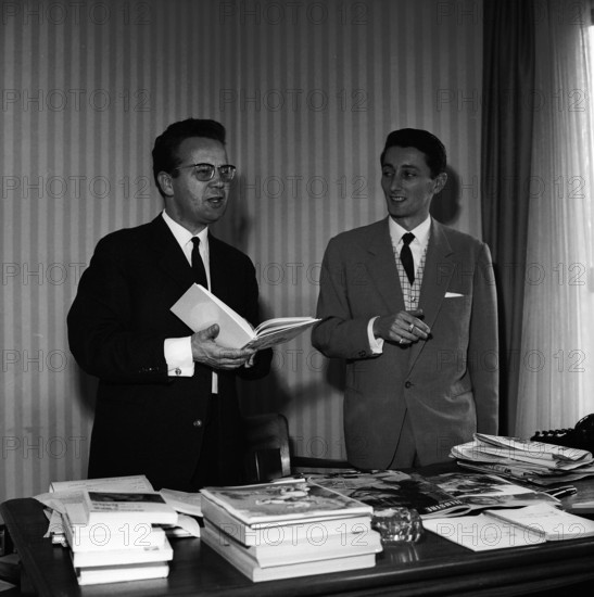 Bernard-Claude Gauthier, chief editor of L'Illustre, with unknown man,1965.