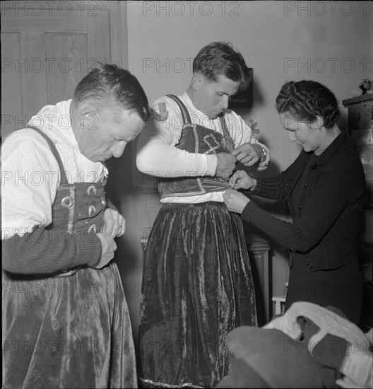 Preparations for Silvesterchlausen in Urnaesch, 1945.