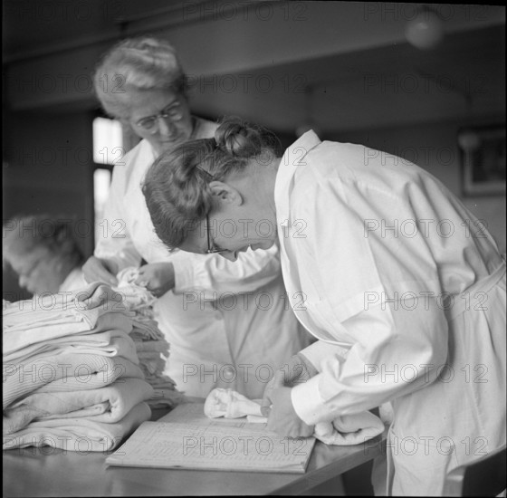 Women during World War 2; women sewing; 1939.