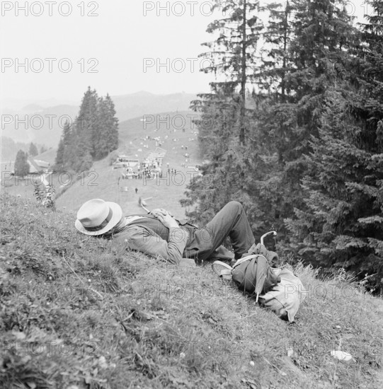 Sleeping man at public festival in the Emmental, in 1948.