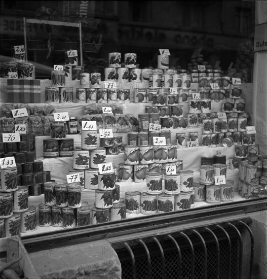 Goods on display in a grocery store; 1942.