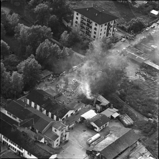 Fire brigade in action after explosion in chemical plant, Locarno 1964.
