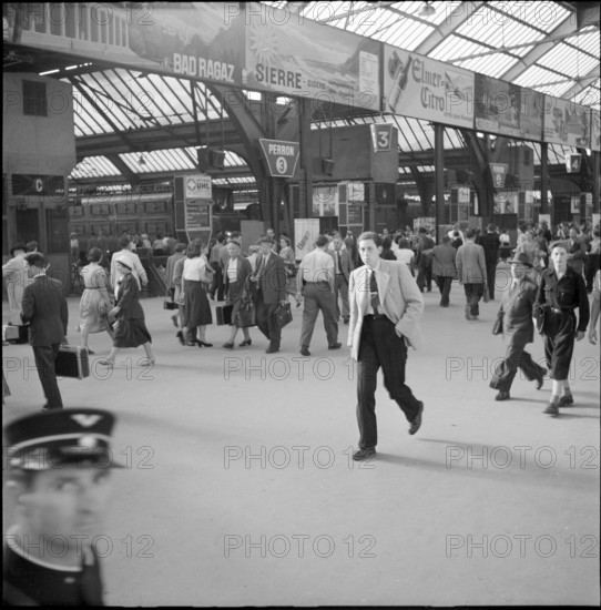 Travellers at Zurich Main Station, 1952.