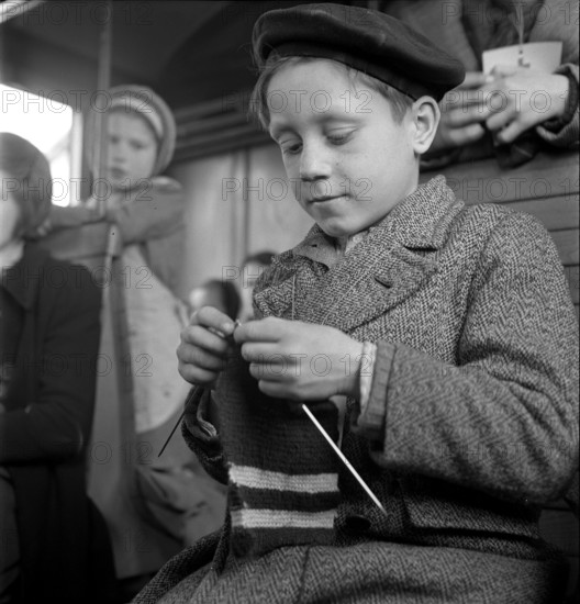 Boy knitting