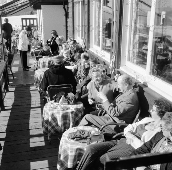Guests in a mountain restaurant near Crans Montana, 1957