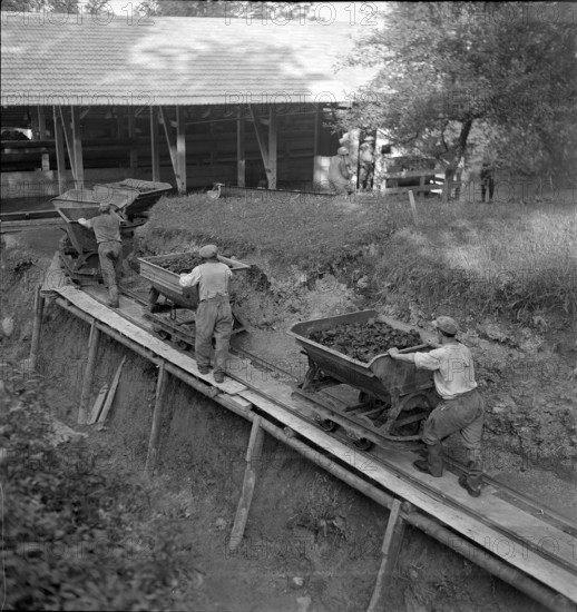 miners; miner car in coal mine; 1941