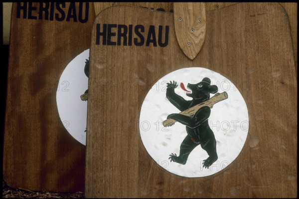 Hornussen festival 1988: decorated boards, board, bats, bat