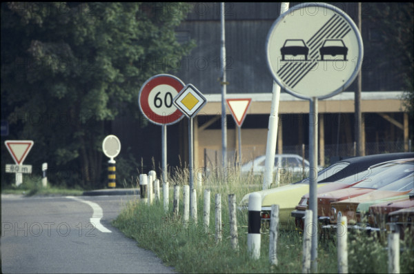 Road sign: No overtaking at the end
