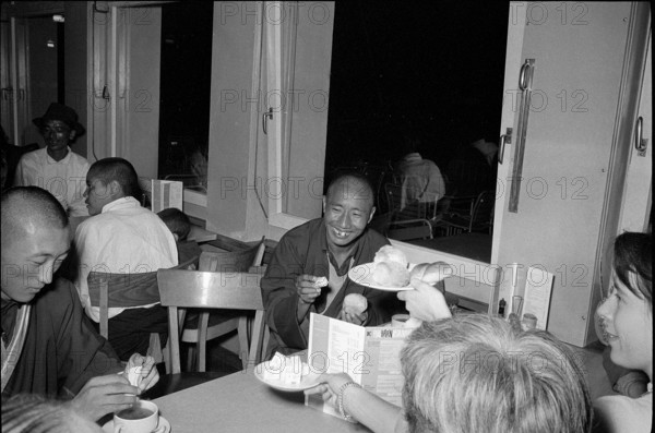 Refugees are given a Swiss breakfast.