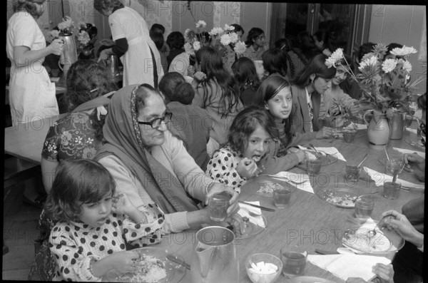 Ugandan refugees being served food, Neuchâtel 1972