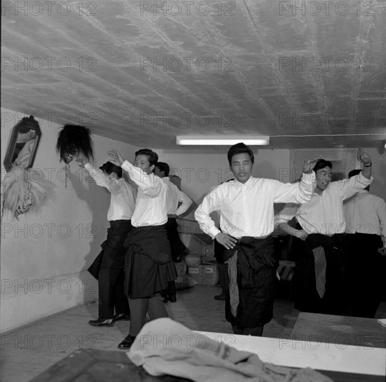 Tibetan men practicing folk dance, Waldstatt 1963