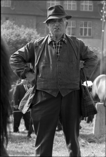 Man at the horse market of Chaindon-Reconvilier, 1969