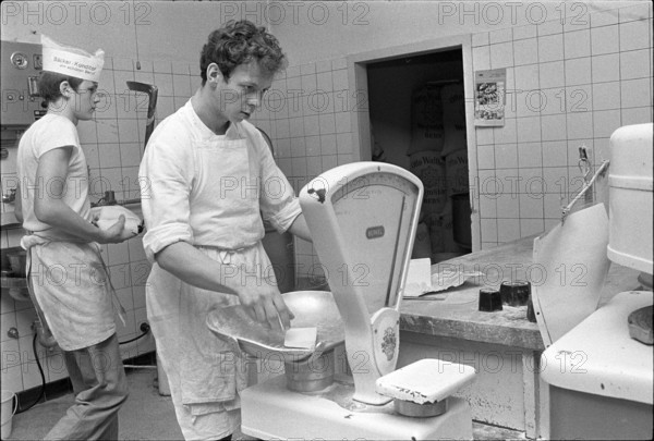 Berne, examinee weighing out ingredient; 1970