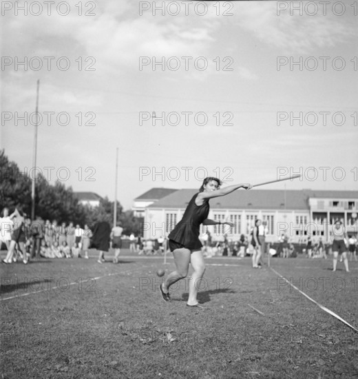 Girl at rounders, Zurich Girls' School 1940