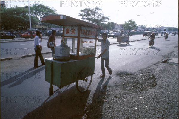 Man with road kitchen, Jakarta, 1986