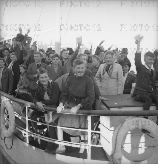 German tourists at the harbor of Romanshorn, 1948