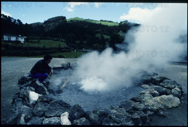 Man by volcanic spring, Geyser, Azores 1984