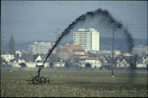 Sludge sprayer on a meadow, 1980