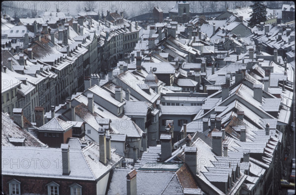 Snow-covered roofs of Bernese old town 1980
