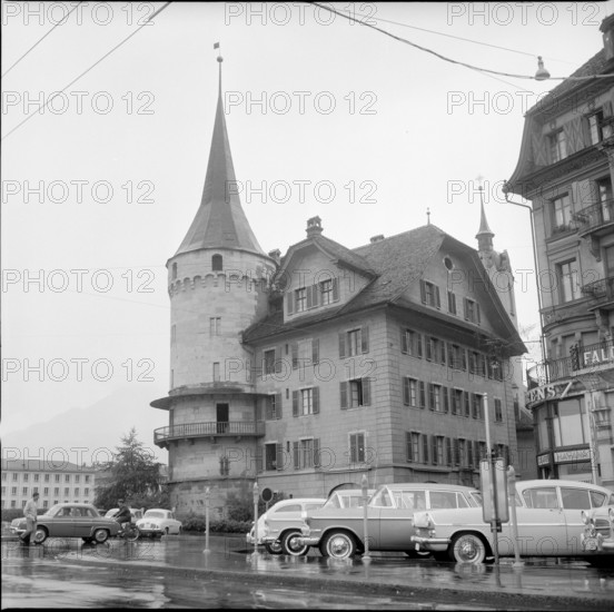 Parked cars in front of the Haus zur Gilgen, Lucerne; 1961