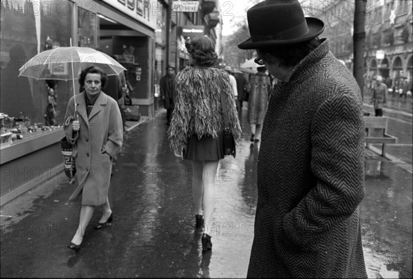 Man looking after woman, 1972